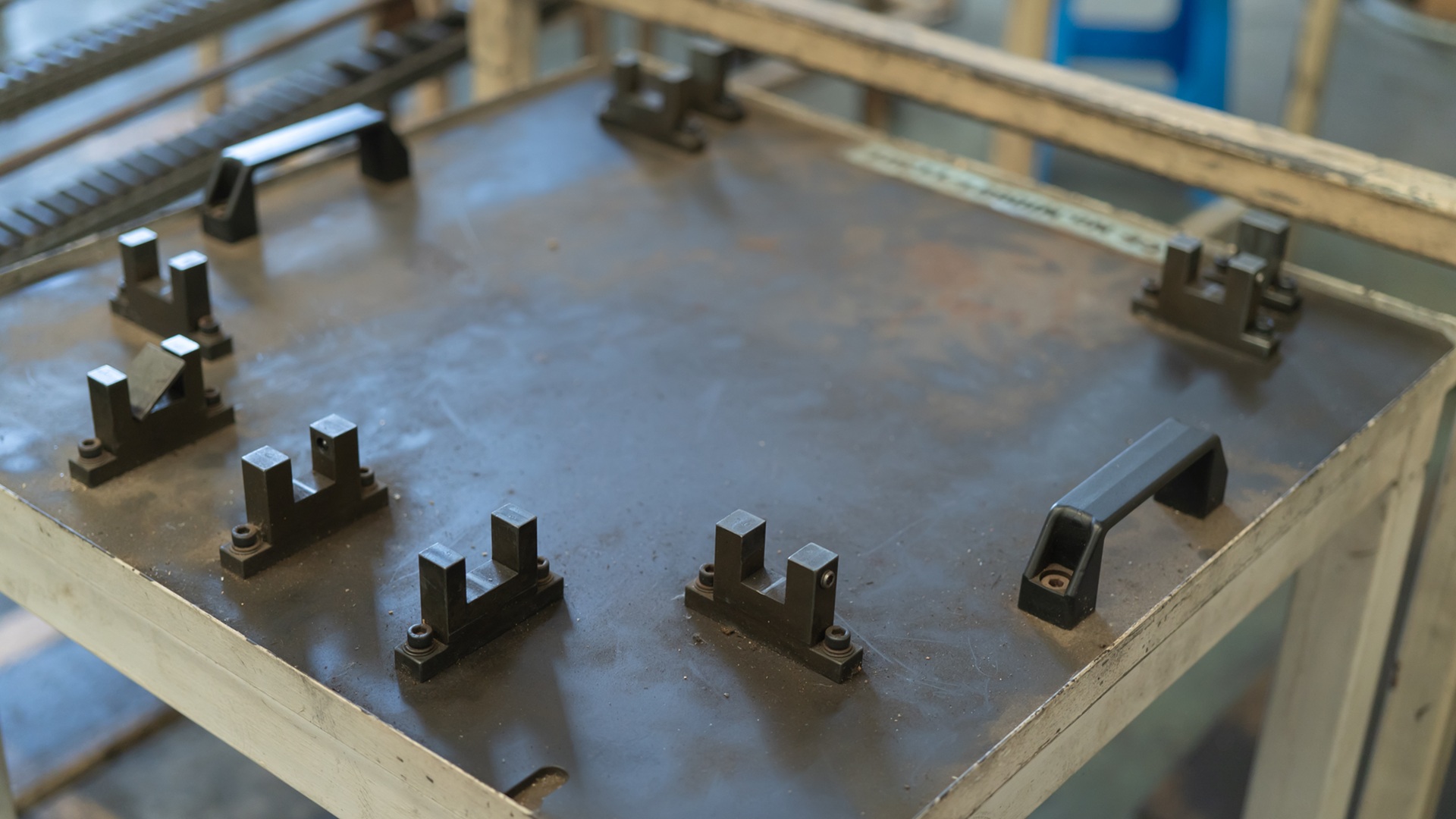 Car seat metal steel structure manufacturing factory with equipment machine engine industrial production system work, technology in operation process in industry plant. Product equipment in warehouse.