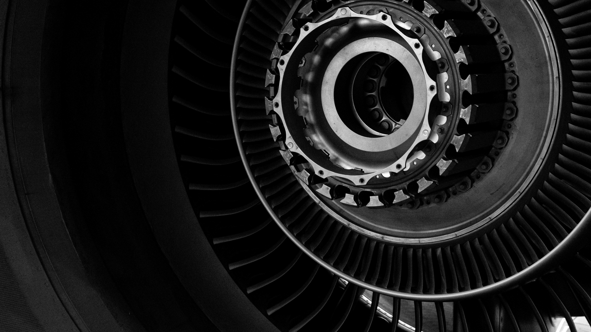 Details of the turboprop engine. Airplane propeller. Turbine mechanism and device. Screws, nuts, the inside of the device. Metallic background. Postcard for a mechanic engineer. Blade and blades.